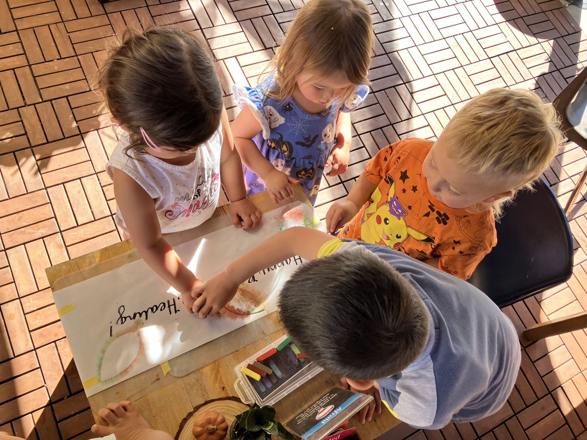 children playing with chalk